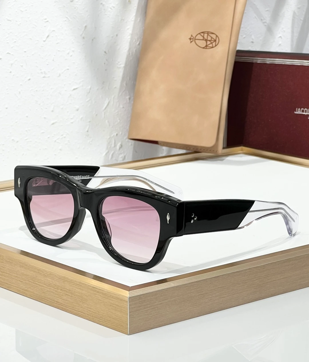 JMM Chelsea Black Pink sunglasses with glossy black acetate frame, soft pink lenses and transparent temple tips
