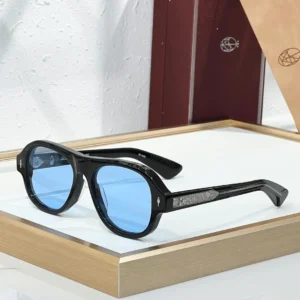 JMM Duende Black Silver Blue sunglasses with black acetate frame, light blue lenses and engraved silver temple detail