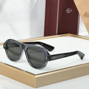 JMM Duende Crystal Dark Grey sunglasses with translucent grey acetate frame, dark smoke lenses and patterned black temples