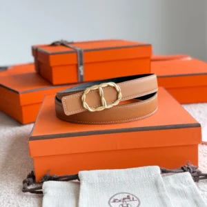 Hermès Maillon Torsade reversible leather belt in camel and black with gold-tone hardware