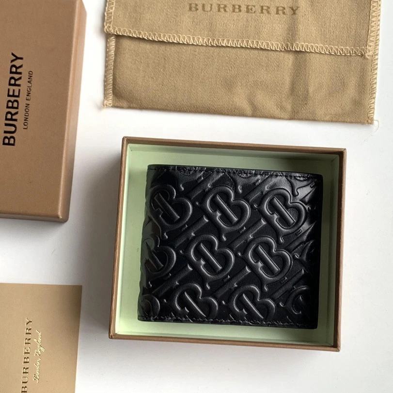 Burberry black calfskin bifold wallet with embossed TB Monogram pattern
