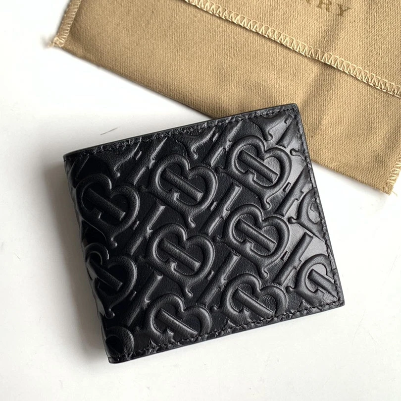 Burberry black calfskin bifold wallet with embossed TB Monogram pattern