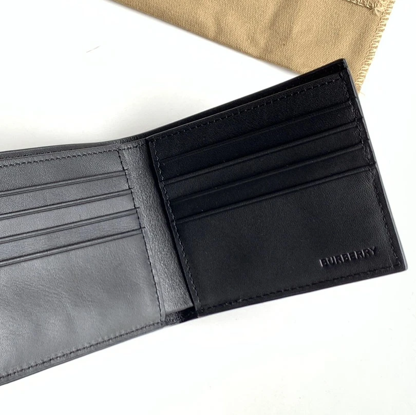 Burberry black calfskin bifold wallet with embossed TB Monogram pattern