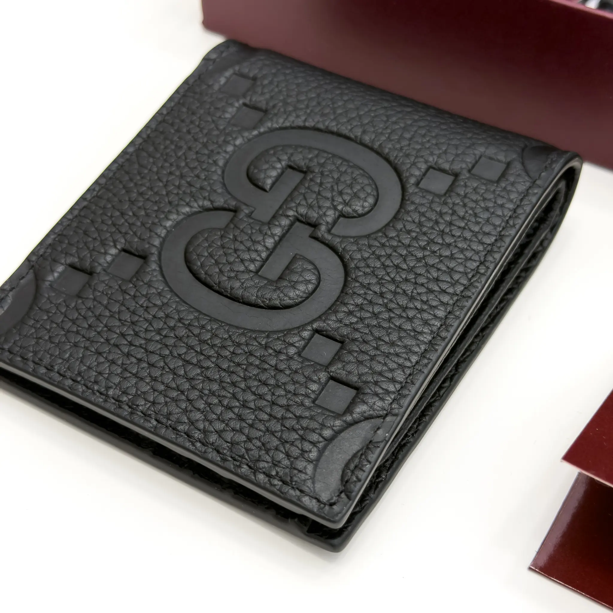 Gucci Jumbo GG black grained leather bifold wallet with oversized tonal GG motif