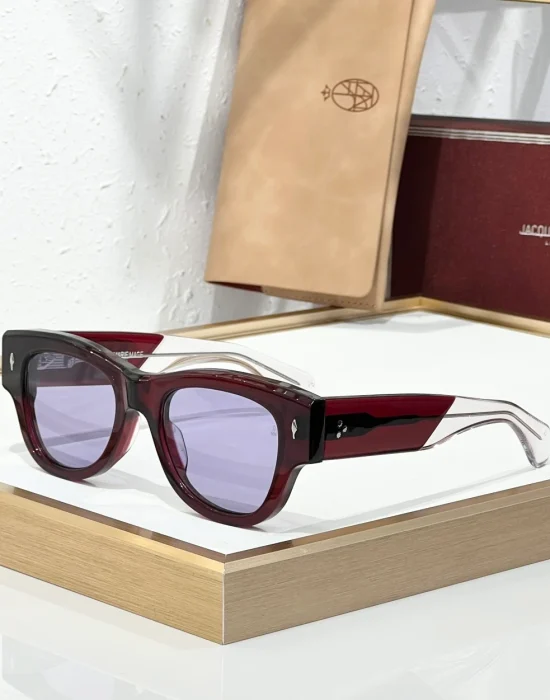 JMM Chelsea Cherry sunglasses with translucent cherry-red acetate frame, lavender lenses and clear temple tips