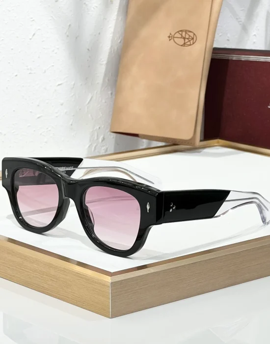 JMM Chelsea Black Pink sunglasses with glossy black acetate frame, soft pink lenses and transparent temple tips