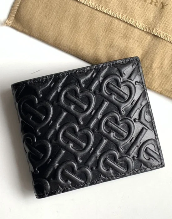 Burberry black calfskin bifold wallet with embossed TB Monogram pattern