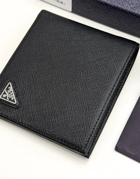 Prada black Saffiano leather bifold wallet with enameled triangle logo