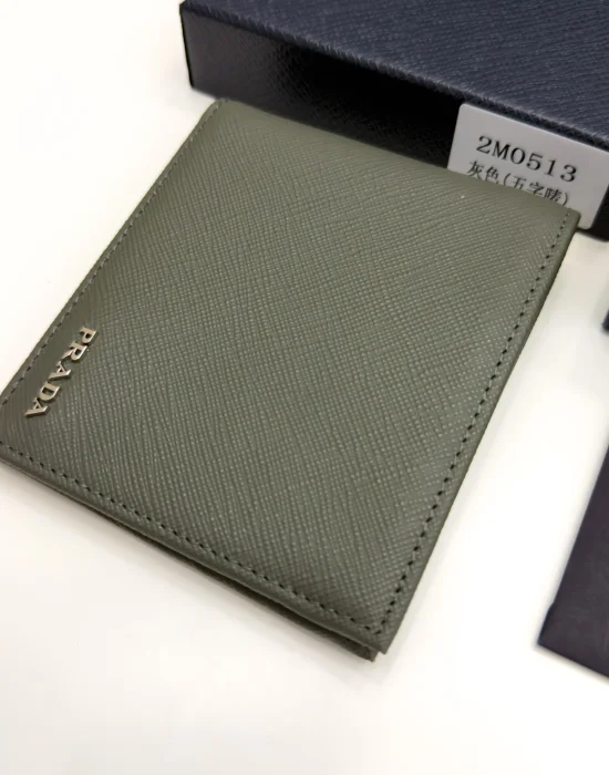 Prada Selva Green Saffiano leather bifold wallet with metal lettering logo