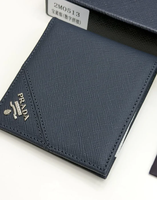 Prada Baltic Blue Saffiano leather bifold wallet with intarsia corner detail and metal logo